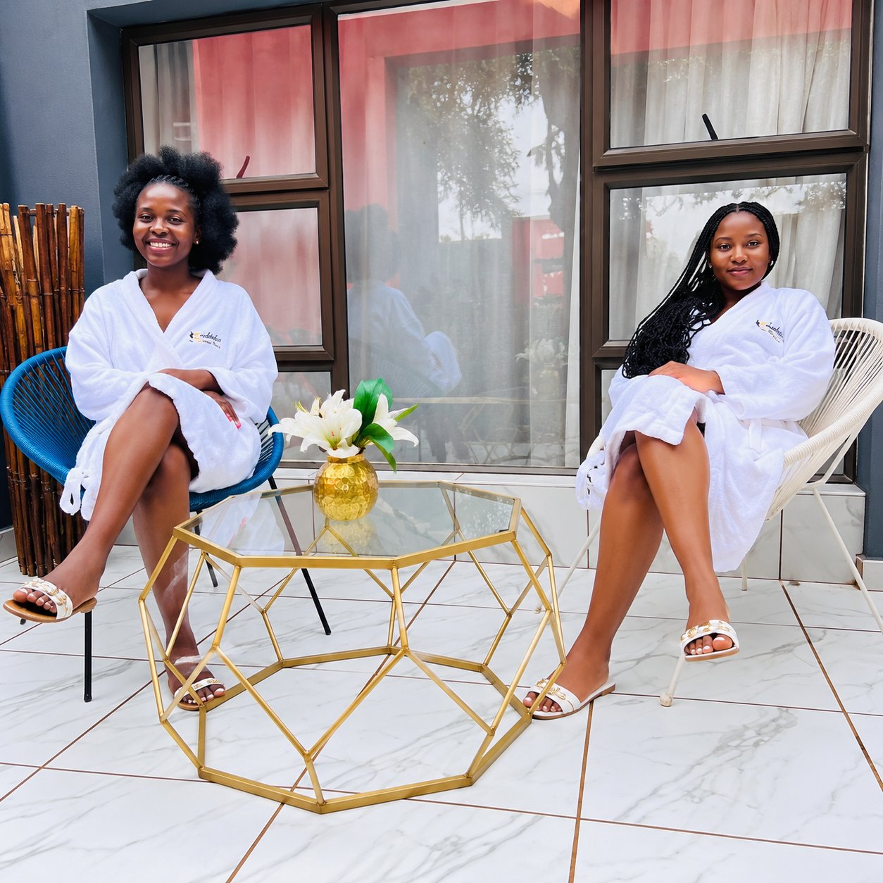 Two guests relaxing together on the spa terrace